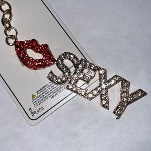 Kiss Sexy Goldtone Bag Charm NWT